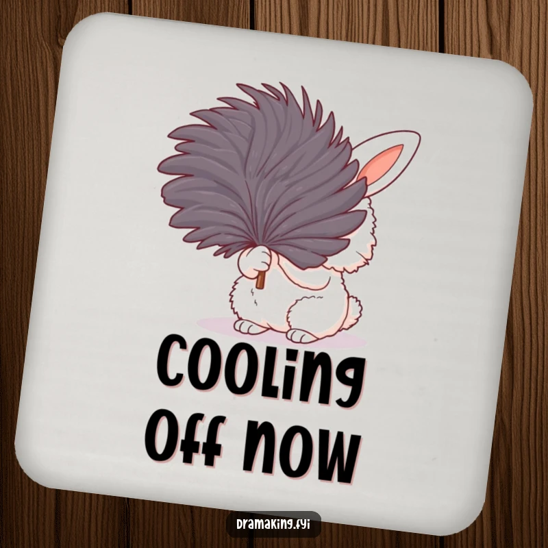 Funny drink coaster with a fluffy bunny fanning itself dramatically with a feather, protecting surfaces with a humorous touch.