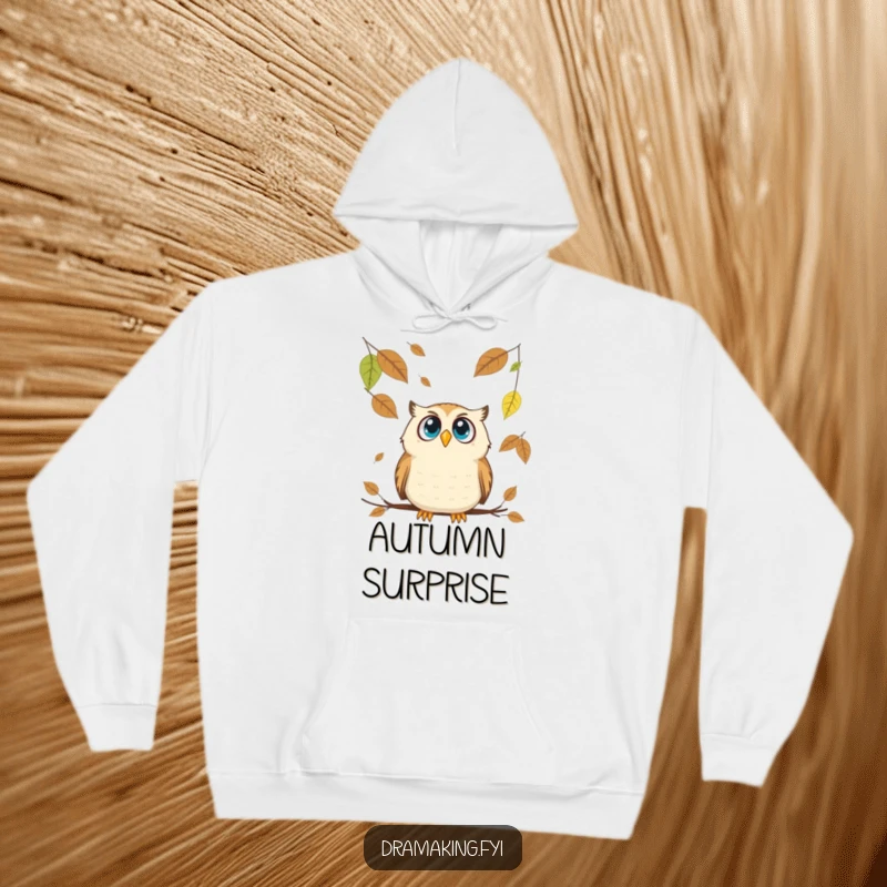 Funny Owl Hoodie: A wide-eyed owl is comically startled by oversized leaves falling around it in this autumn design.