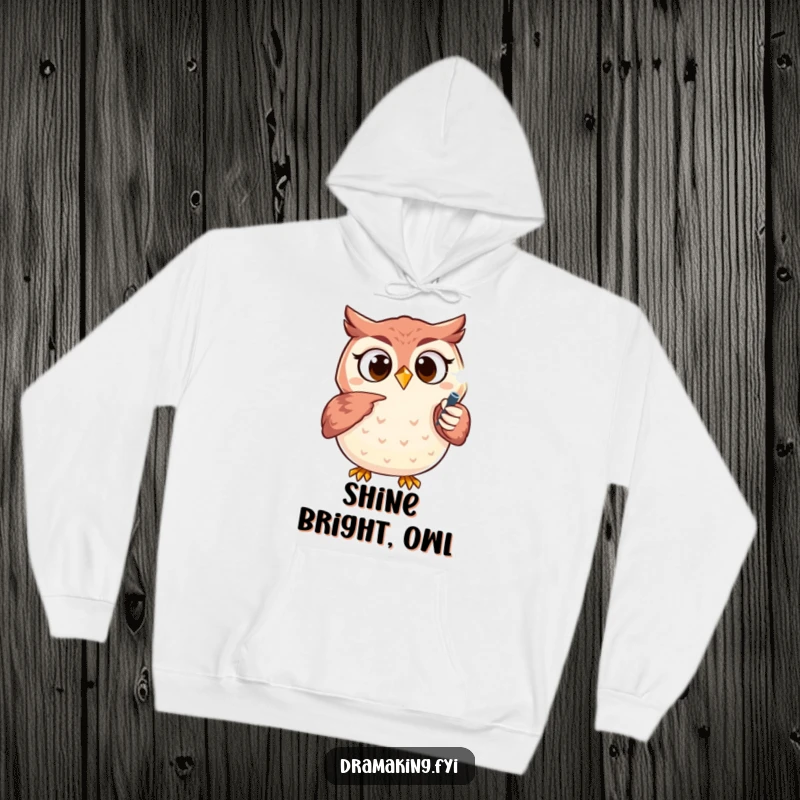 Funny owl hoodie featuring an excited character pointing at a sparkling spotlight, symbolizing ambition and comfort.
